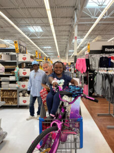 Glorious with her shopping day purchases